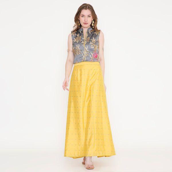 Grey embroidered top and yellow skirt